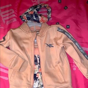 Girl’s Reebok track suit with matching headband
